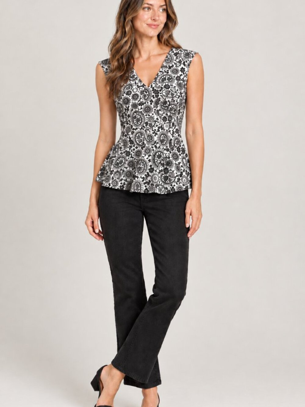 Paisley black and white top with bold back zipper & pleated waist peblum